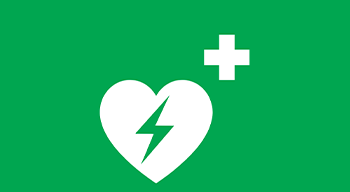 białe serce i krzyż na zielonym tle