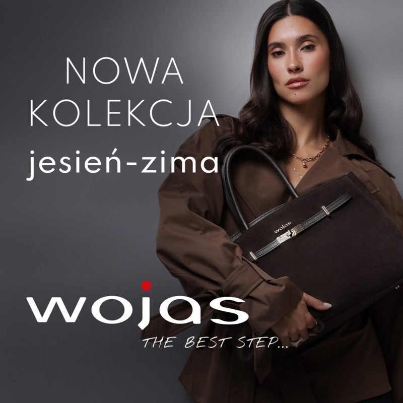 Kwadratowe zdjęcie reklamowe marki WOJAS z nowej kolekcji jesienno-zimowej. Prezentuje ciemnowłosą modelkę w brązowym płaszczu trzymającą elegancką, ciemnobrązową skórzaną torbę z jasnym akcentem i logo WOJAS. Po lewej stronie widnieje biały napis NOWA KOLEKCJA jesień-zima, a na dole duże białe logo WOJAS z czerwoną kropką oraz sloganem THE BEST STEP....