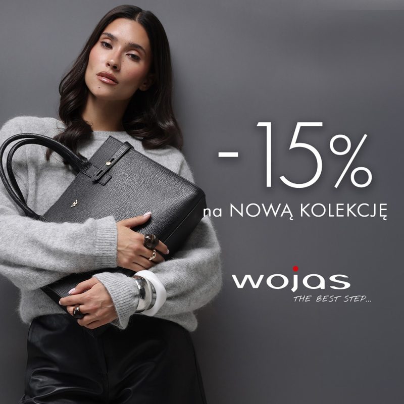 Kobieta w szarym swetrze trzymająca czarną skórzaną torbę na plakacie promocyjnym Wojas z rabatem 15 procent w CH Galaxy Szczecin